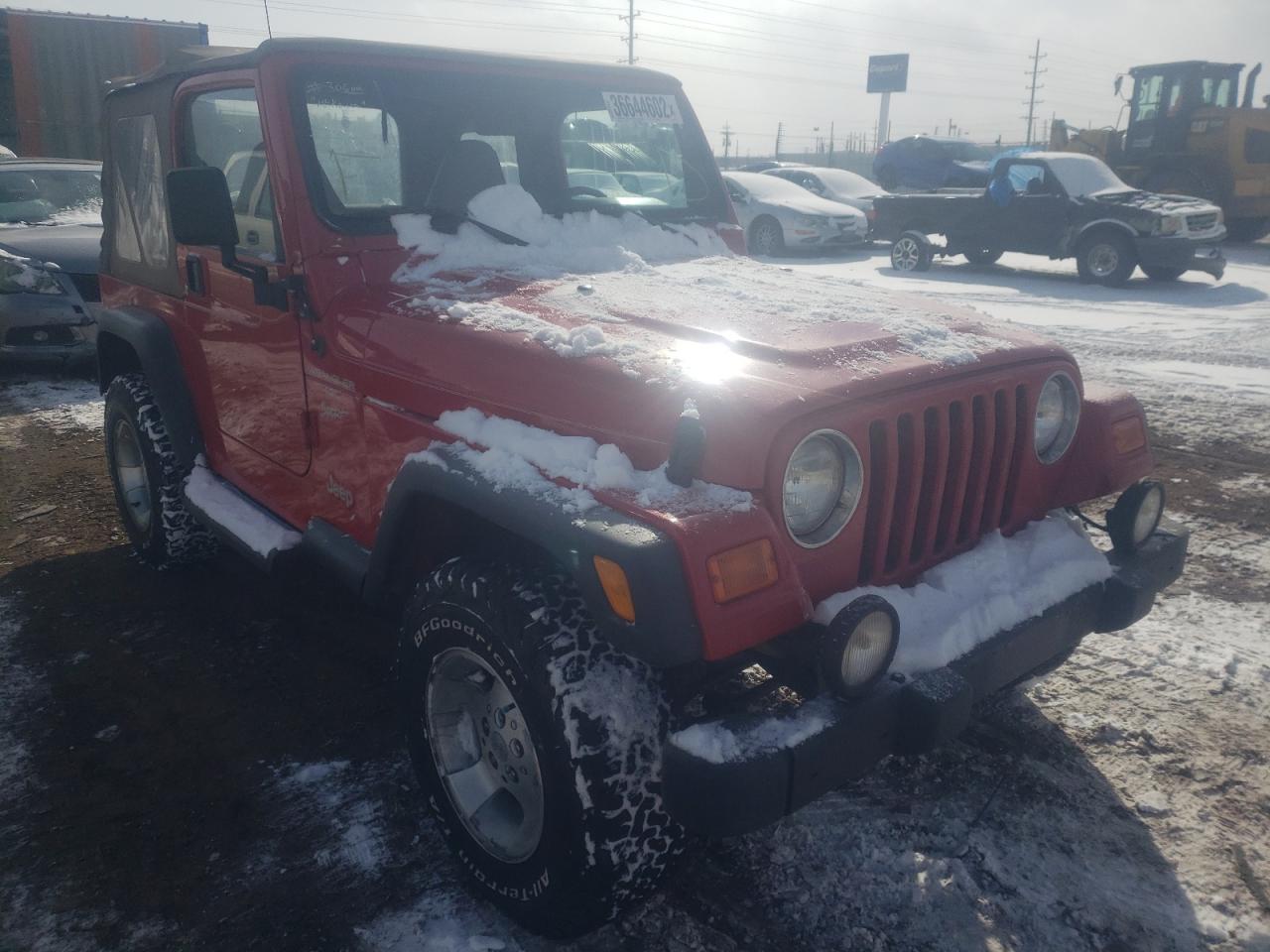 JEEP WRANGLER / 2000 with VIN 1J4FA49S4YP763705 - Photo from auction