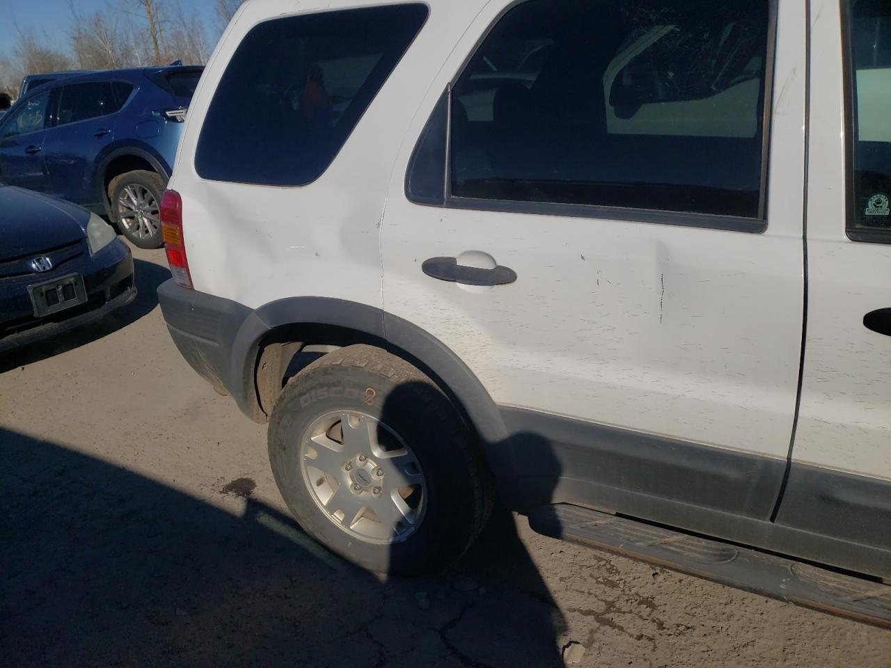 Photo 10 from auction – 2004 FORD ESCAPE XLT with VIN 1FMYU93174KA61609