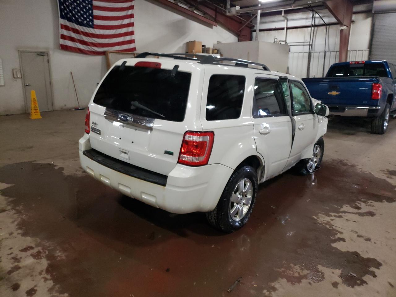 Photo 4 from auction – 2010 FORD ESCAPE LIM with VIN 1FMCU9EG7AKC83994