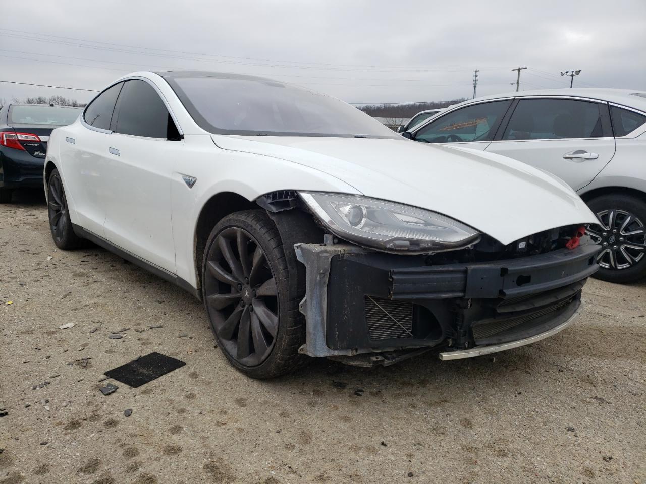 TESLA MODEL S 2013 with VIN 5YJSA1DP5DFP07203 - Photo from auction