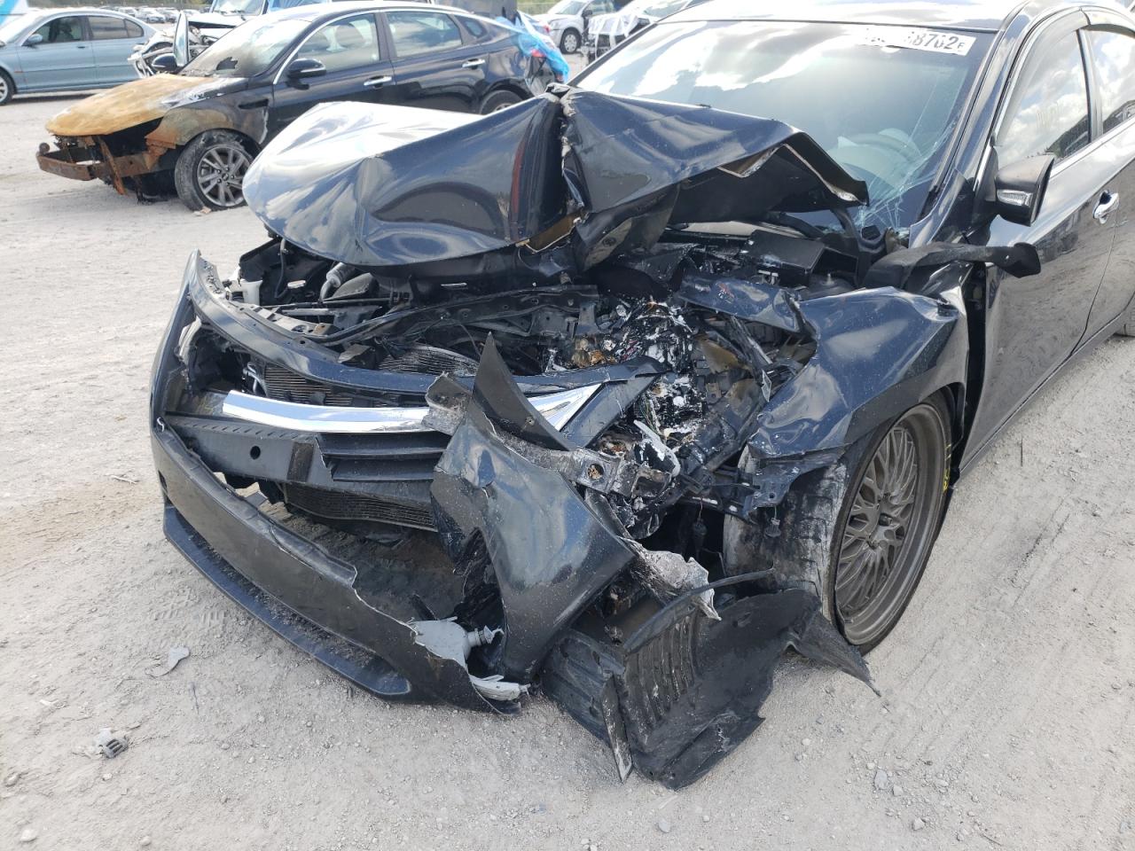 Photo 9 from auction – 2014 NISSAN ALTIMA 2.5 with VIN 1N4AL3APXEN390159