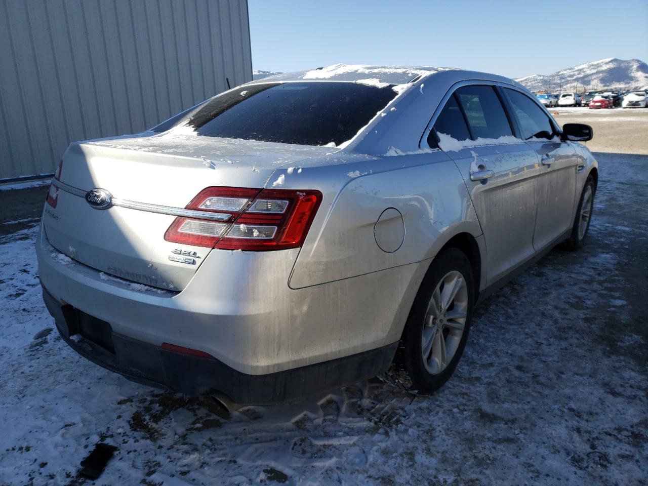 Photo 4 from auction – 2013 FORD TAURUS SEL with VIN 1FAHP2H82DG204788