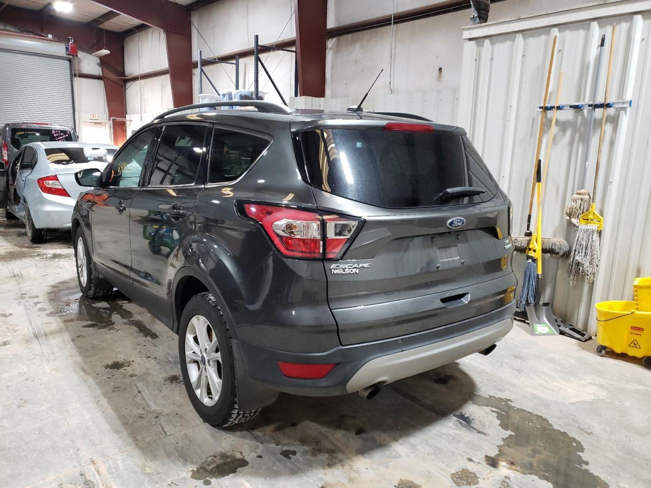 Photo 3 from auction – 2018 FORD ESCAPE SE with VIN 1FMCU0GD5JUB85484