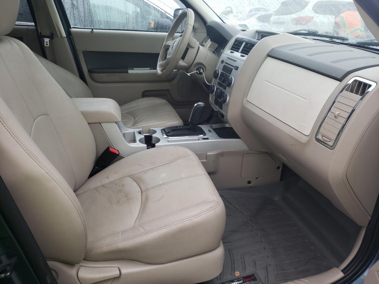Photo 5 from auction – 2010 MERCURY MARINER PR with VIN 4M2CN9HG4AKJ06567