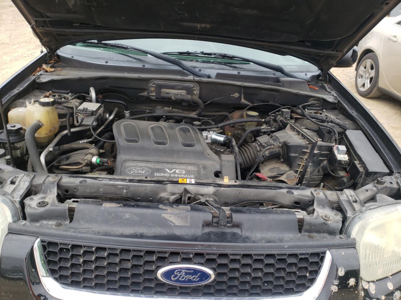 Photo 7 from auction – 2002 FORD ESCAPE XLT with VIN 1FMCU04182KD00926