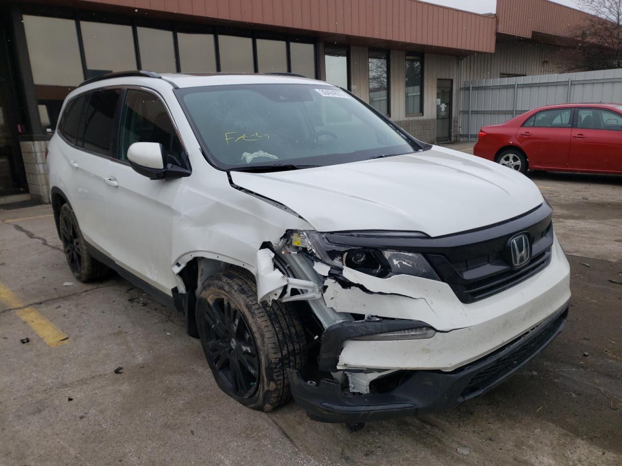 HONDA PILOT SE 2021 with VIN 5FNYF6H28MB013869 - Photo from auction