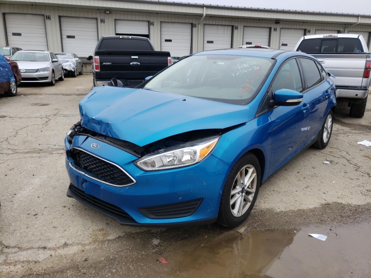 Photo 2 from auction – 2016 FORD FOCUS SE with VIN 1FADP3F24GL358983