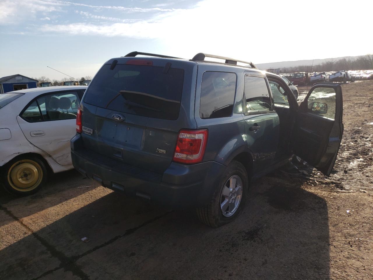 Photo 4 from auction – 2011 FORD ESCAPE with VIN 1FMCU9DG1BKA30866