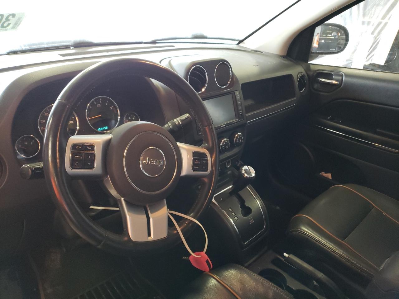 Photo 9 from auction – 2011 JEEP COMPASS LI with VIN 1J4NT5FB0BD167368