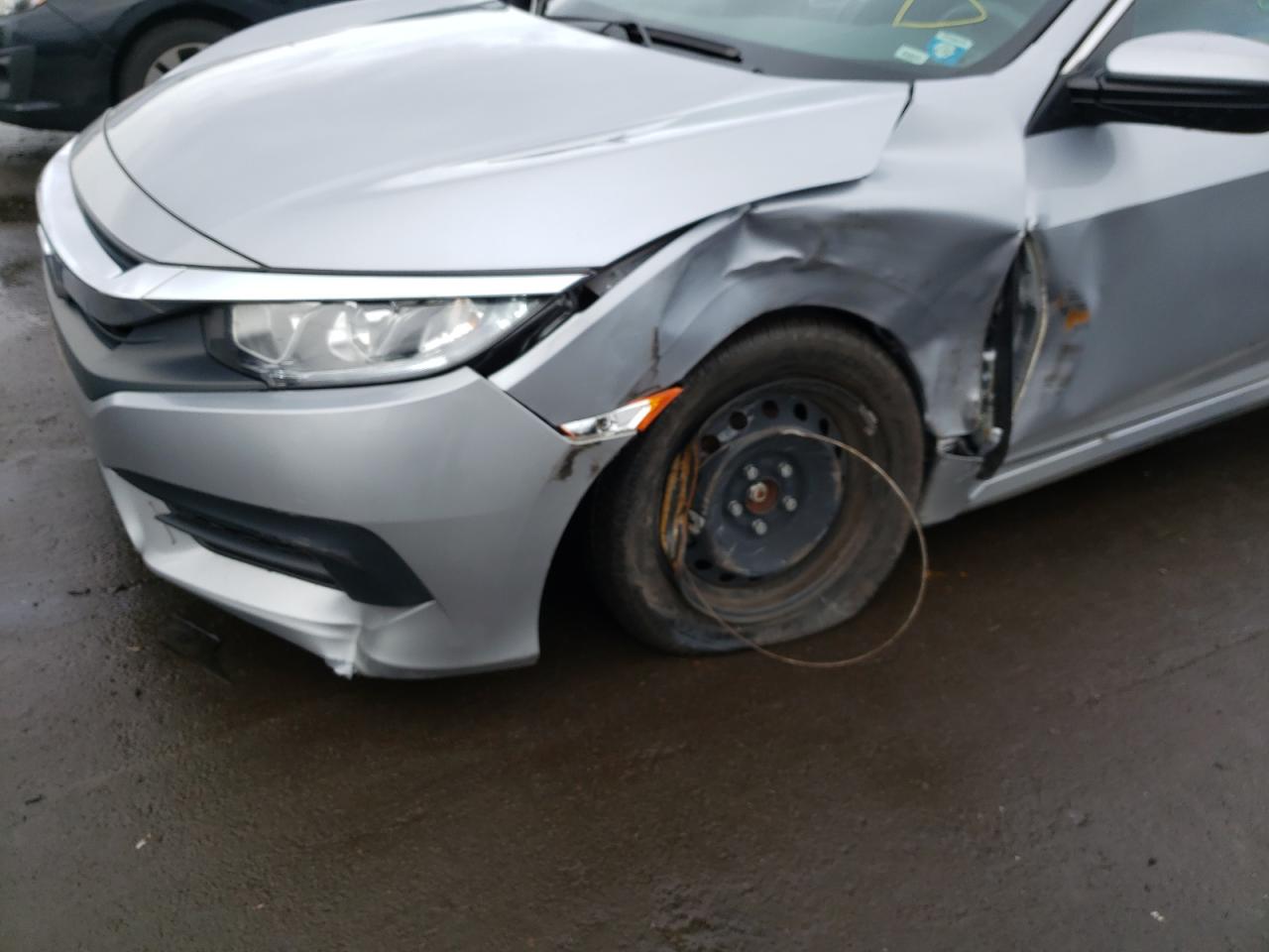 Photo 9 from auction – 2016 HONDA CIVIC LX with VIN 2HGFC2F52GH516979