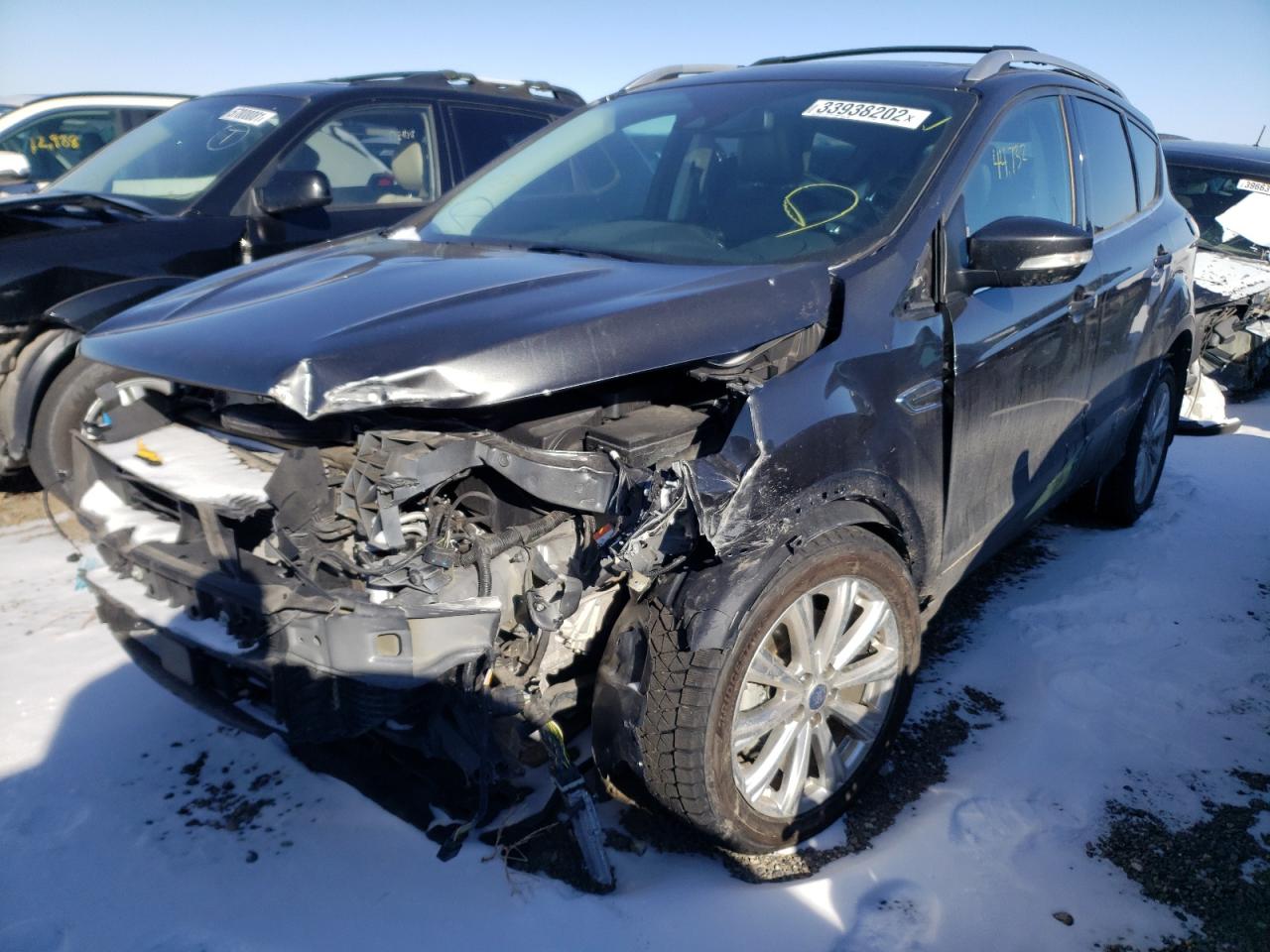 Photo 2 from auction – 2017 FORD ESCAPE TIT with VIN 1FMCU9J98HUC96288