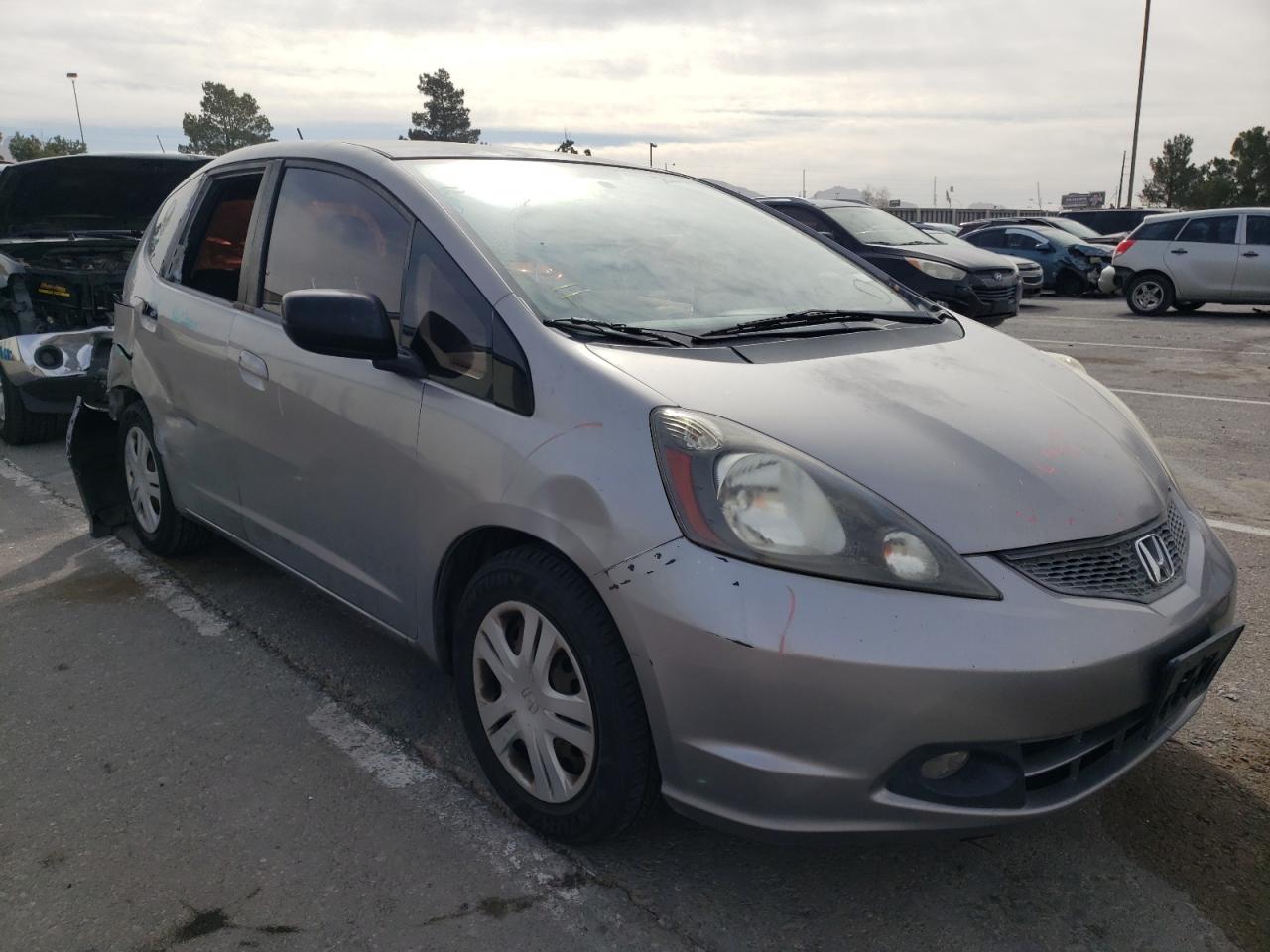 HONDA FIT 2009 with VIN JHMGE87249S007989 - Photo from auction