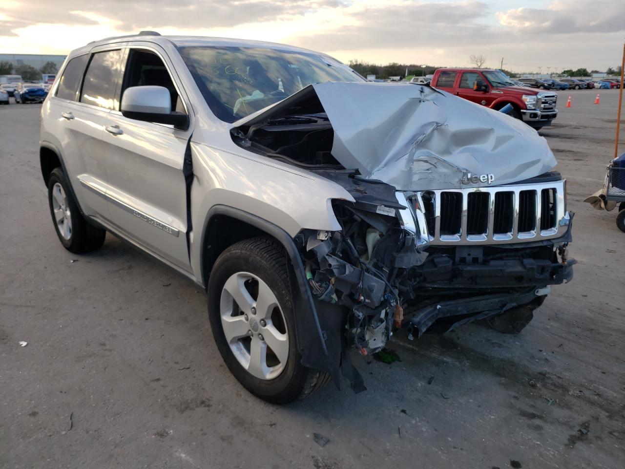 JEEP GRAND CHER 2011 with VIN 1J4RS4GG4BC583440 - Photo from auction