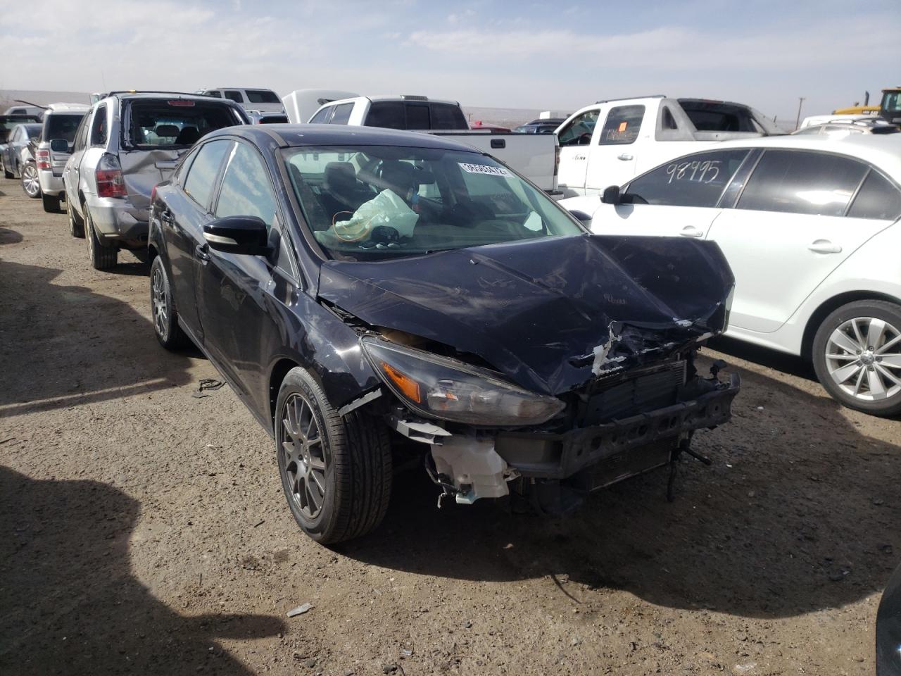 FORD FOCUS SE 2017 with VIN 1FADP3FE1HL263499 - Photo from auction