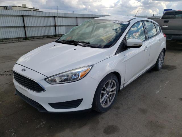 Photo 2 from auction – 2016 FORD FOCUS SE with VIN 1FADP3K29GL352036