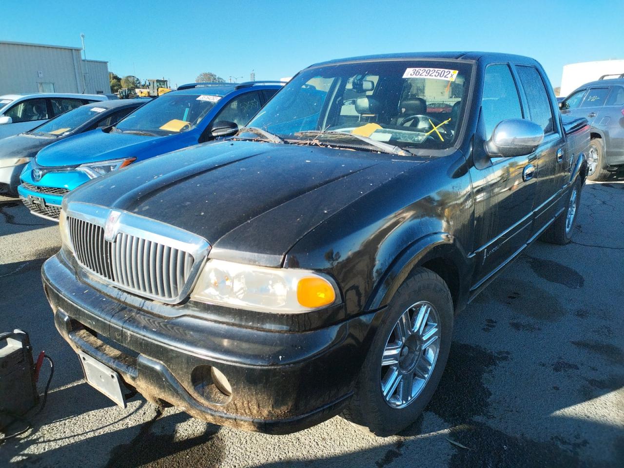 Photo 2 from auction – 2002 LINCOLN BLACKWOOD with VIN 5LTEW05A02KJ00187