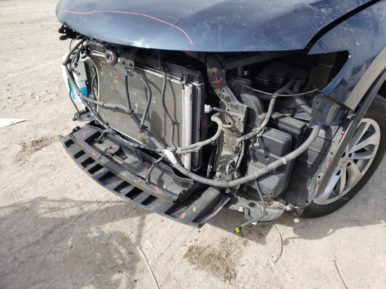 Photo 9 from auction – 2015 NISSAN ROGUE S with VIN 5N1AT2MV3FC764215