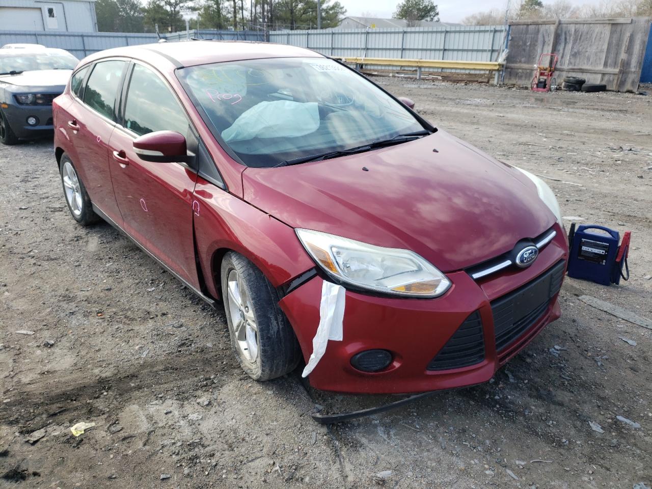 FORD FOCUS SE 2014 with VIN 1FADP3K29EL302945 - Photo from auction