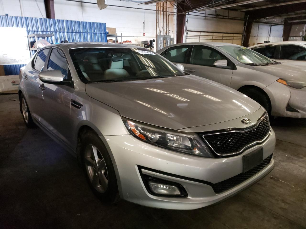 KIA OPTIMA LX 2015 with VIN 5XXGM4A70FG360642 - Photo from auction