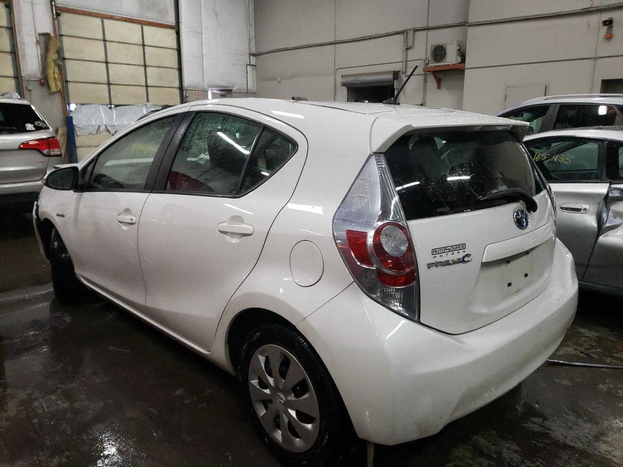 Photo 3 from auction – 2014 TOYOTA PRIUS C with VIN JTDKDTB35E1561026