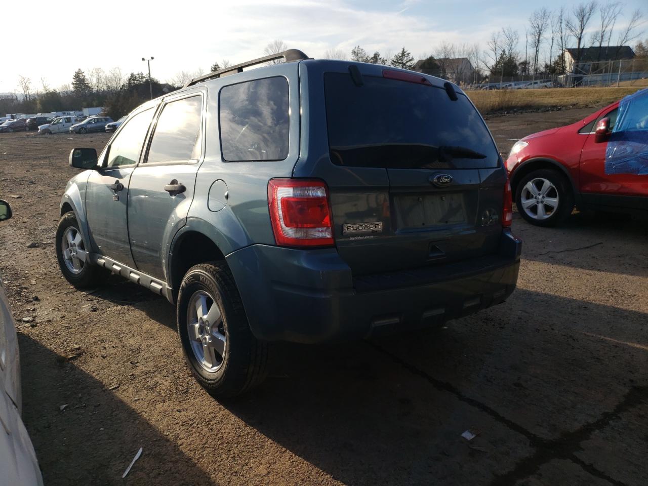 Photo 3 from auction – 2011 FORD ESCAPE with VIN 1FMCU9DG1BKA30866