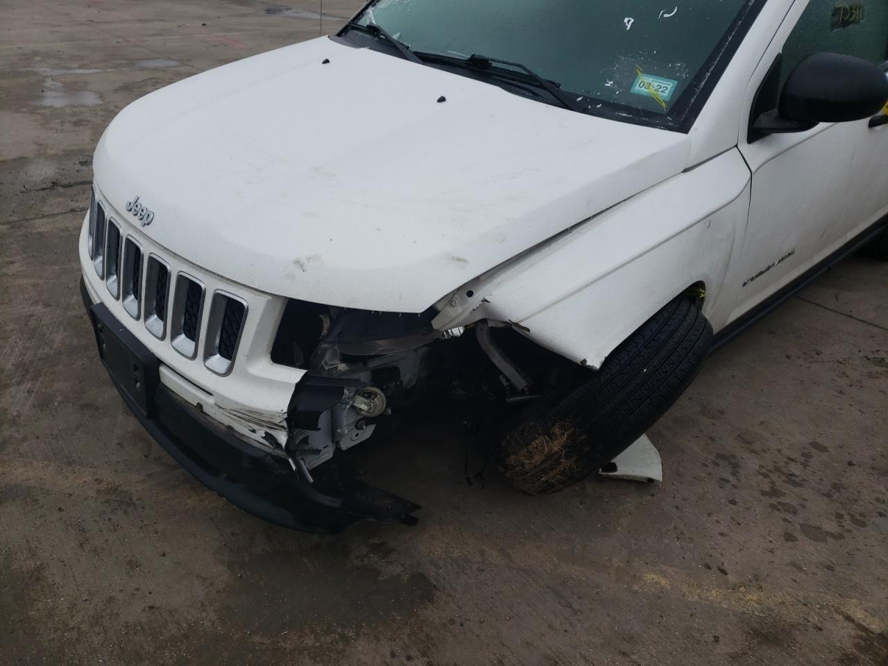 Photo 9 from auction – 2014 JEEP COMPASS SP with VIN 1C4NJCBA2ED536068