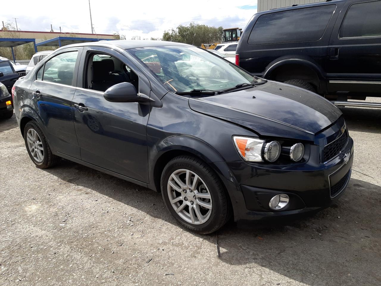 CHEVROLET SONIC LT 2015 with VIN 1G1JC5SH0F4127935 - Photo from auction