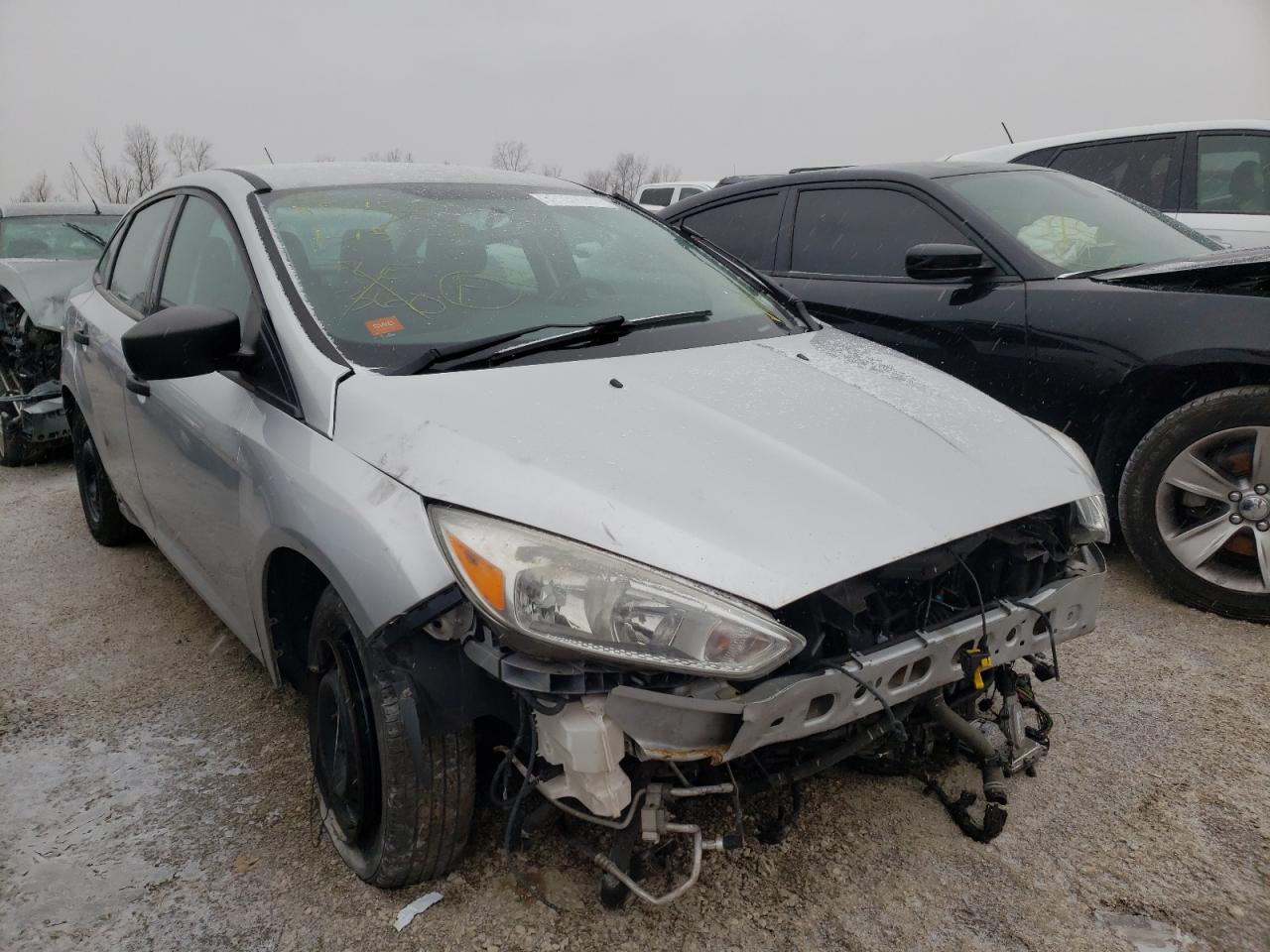FORD FOCUS S 2016 with VIN 1FADP3E21GL306857 - Photo from auction