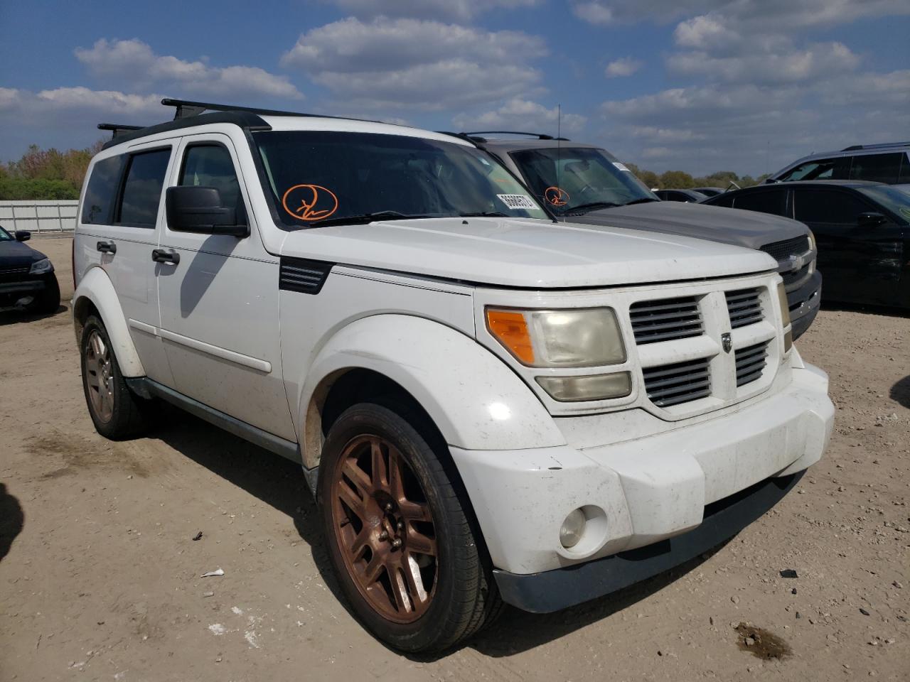 DODGE NITRO HEAT 2011 with VIN 1D4PT4GK7BW589765 - Photo from auction