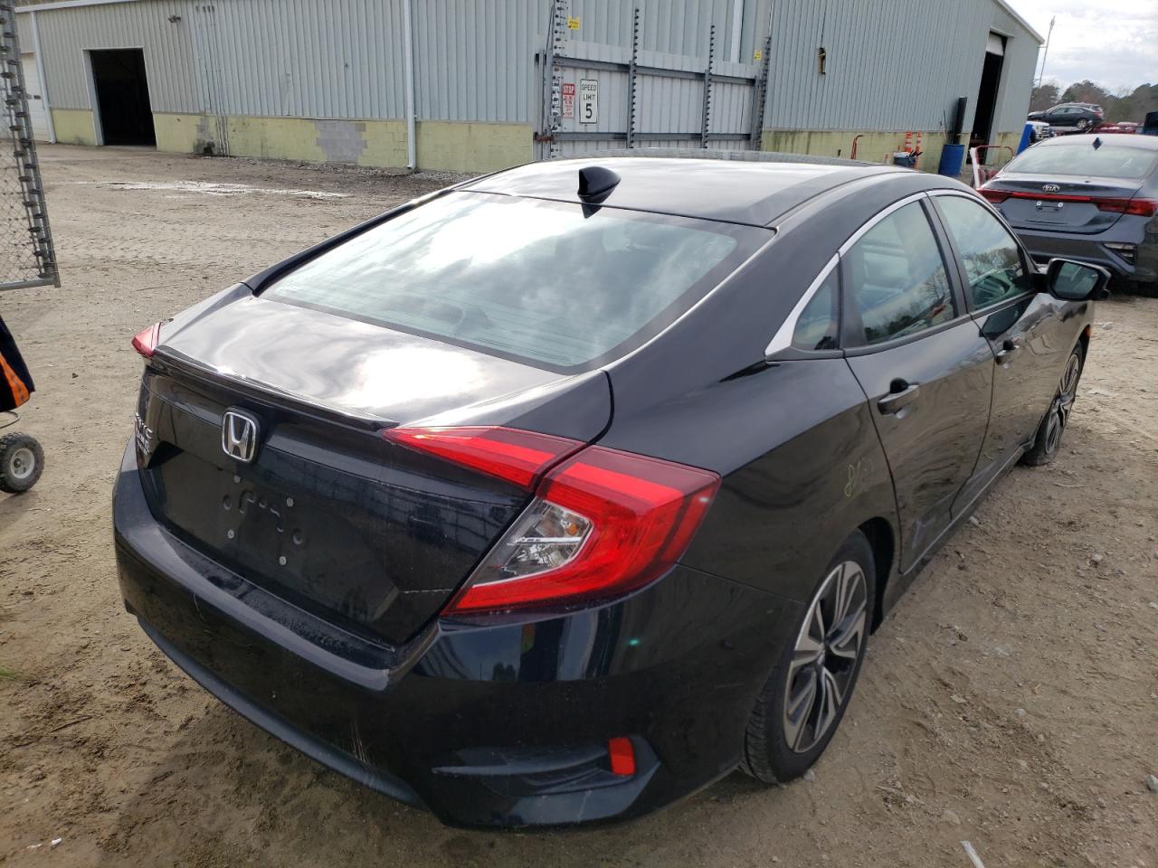 Photo 4 from auction – 2016 HONDA CIVIC EXL with VIN 2HGFC1F74GH636360