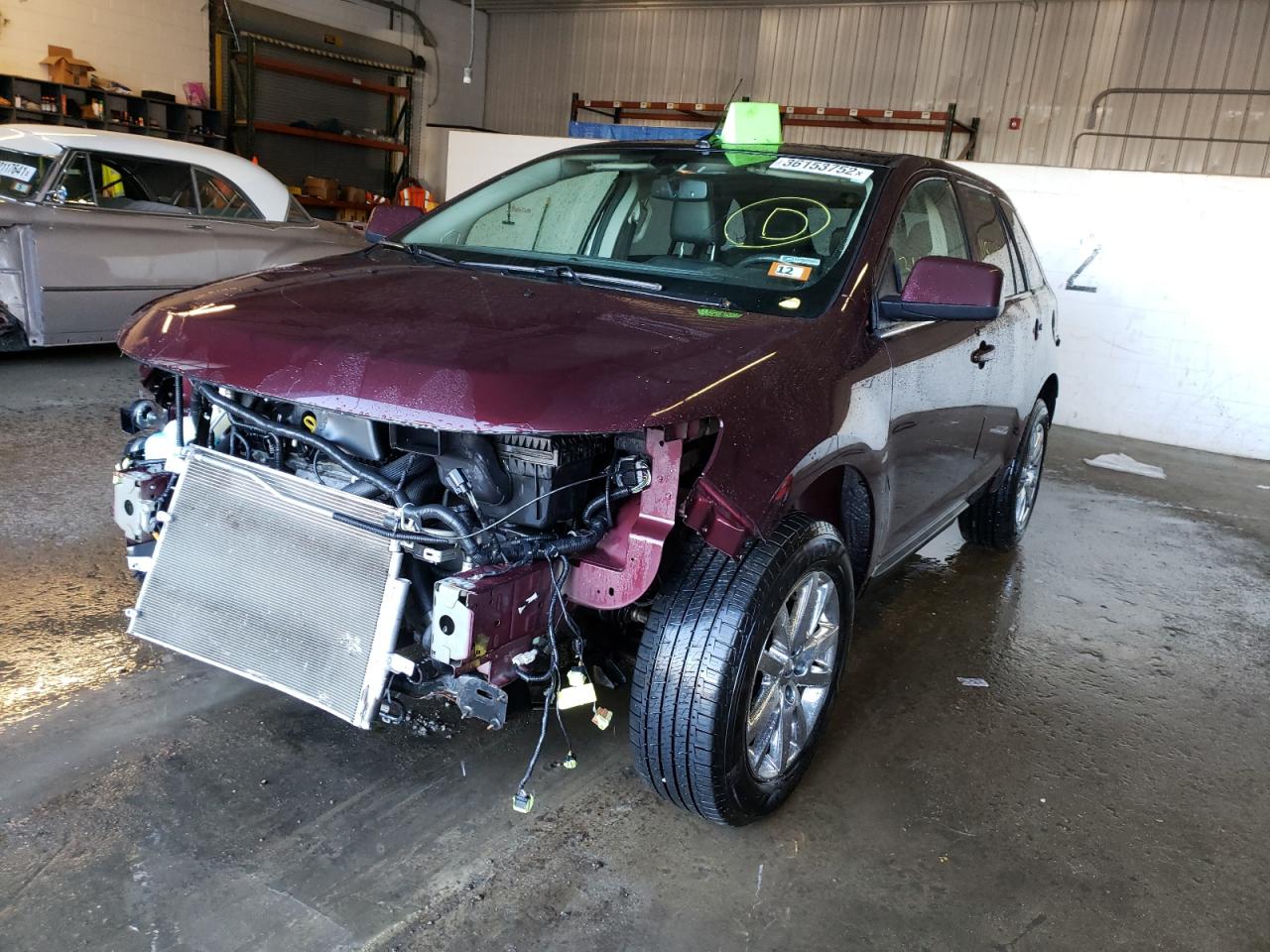 Photo 2 from auction – 2011 FORD EDGE LIMIT with VIN 2FMDK4KC0BBA40697