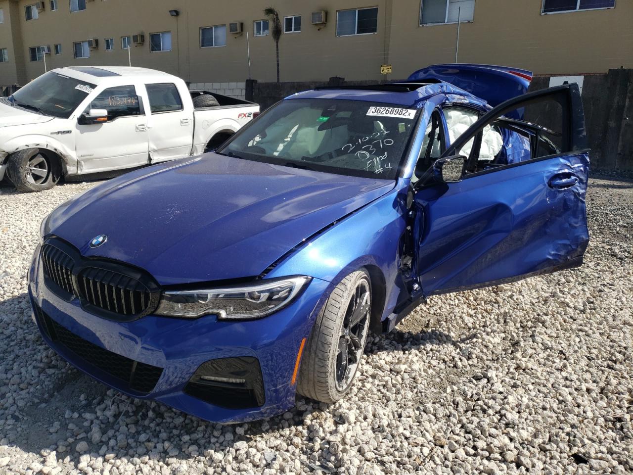 Photo 2 from auction – 2021 BMW 330I with VIN 3MW5R1J06M8C10370
