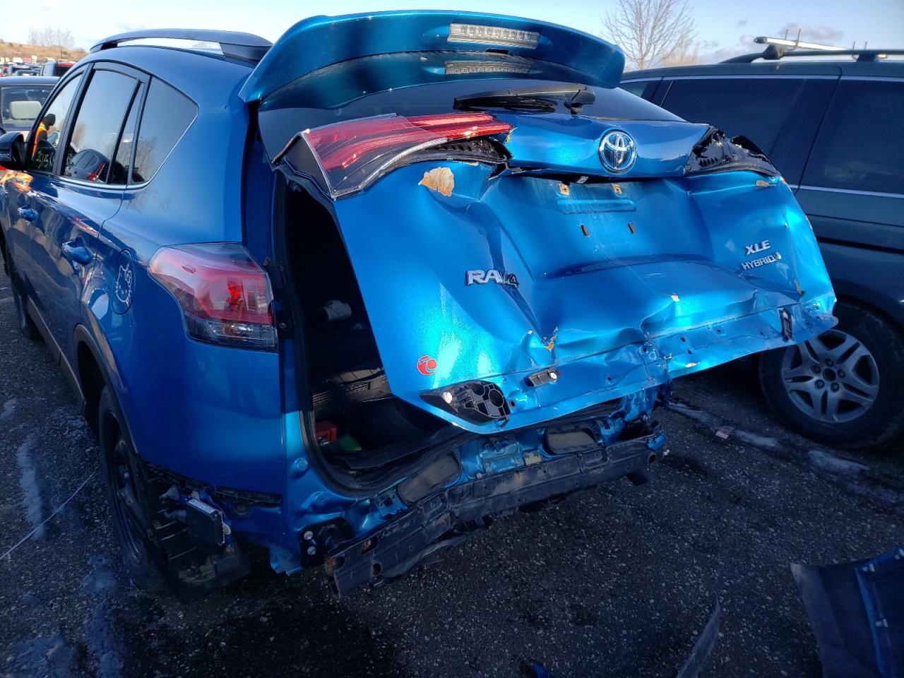 Photo 9 from auction – 2017 TOYOTA RAV4 HV LE with VIN JTMRJREV7HD098588