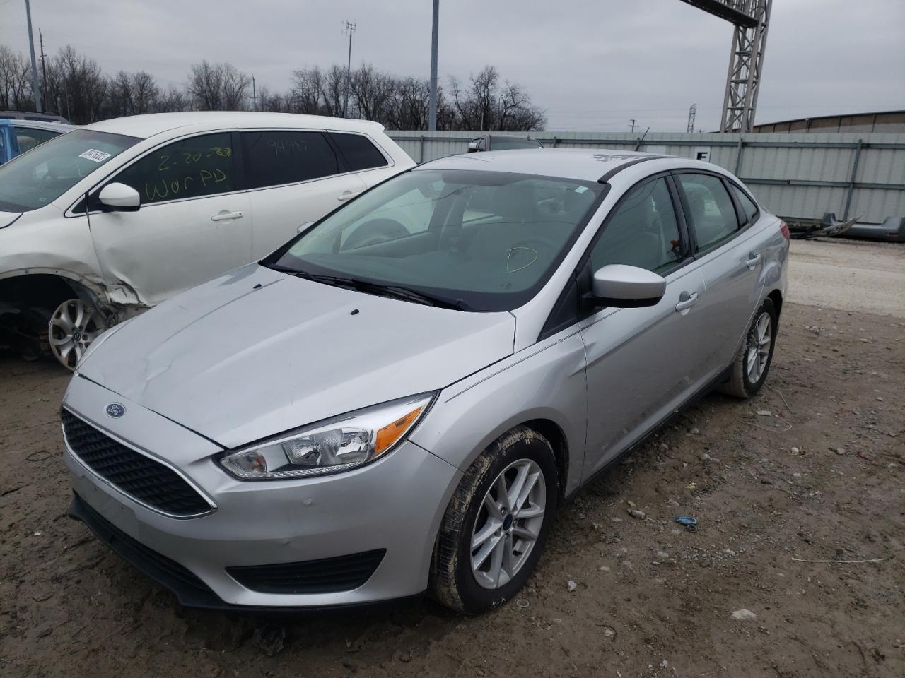 Photo 2 from auction – 2018 FORD FOCUS SE with VIN 1FADP3F27JL225318