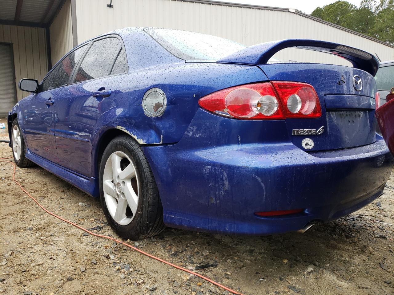 Photo 3 from auction – 2003 MAZDA 6 I with VIN 1YVFP80C935M54585