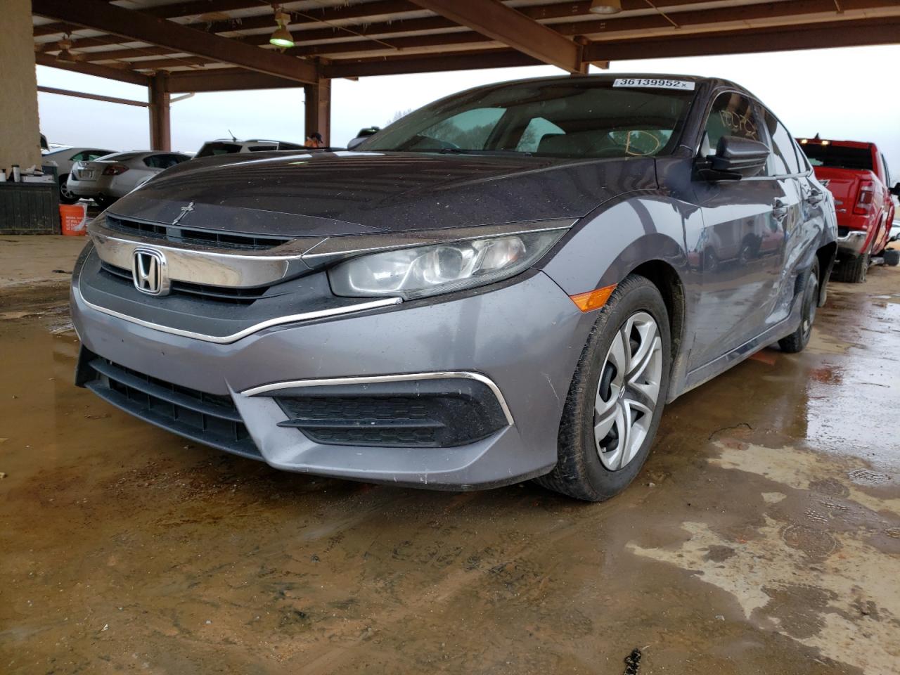 Photo 2 from auction – 2016 HONDA CIVIC LX with VIN 19XFC2F57GE046166
