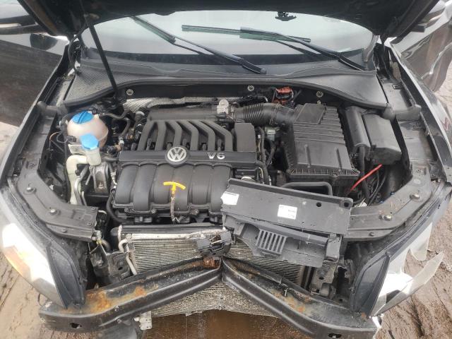 Photo 7 from auction – 2014 VOLKSWAGEN PASSAT SE with VIN 1VWBM7A37EC013782