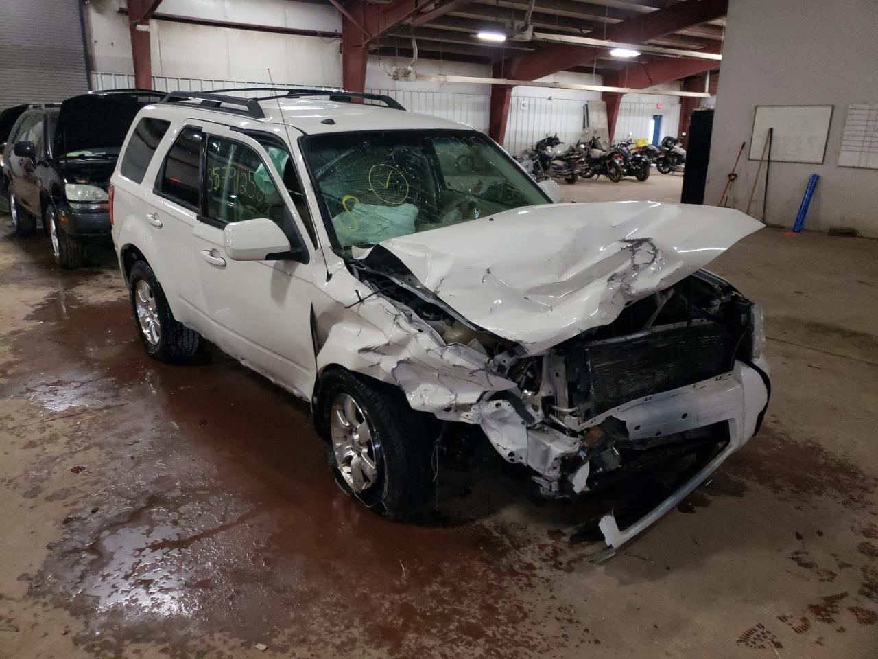 FORD ESCAPE LIM 2010 with VIN 1FMCU9EG7AKC83994 - Photo from auction
