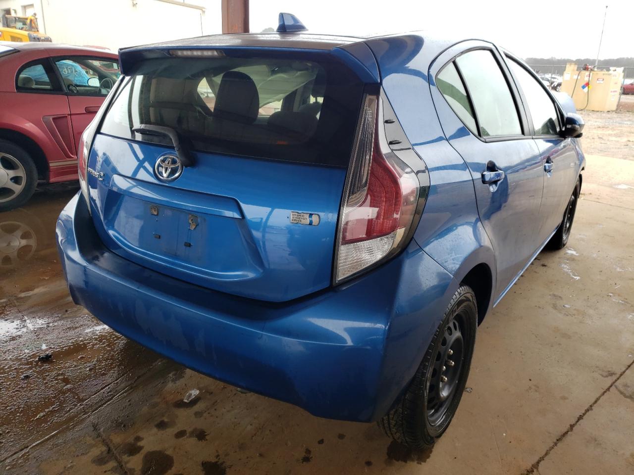 Photo 4 from auction – 2015 TOYOTA PRIUS C with VIN JTDKDTB31F1102111