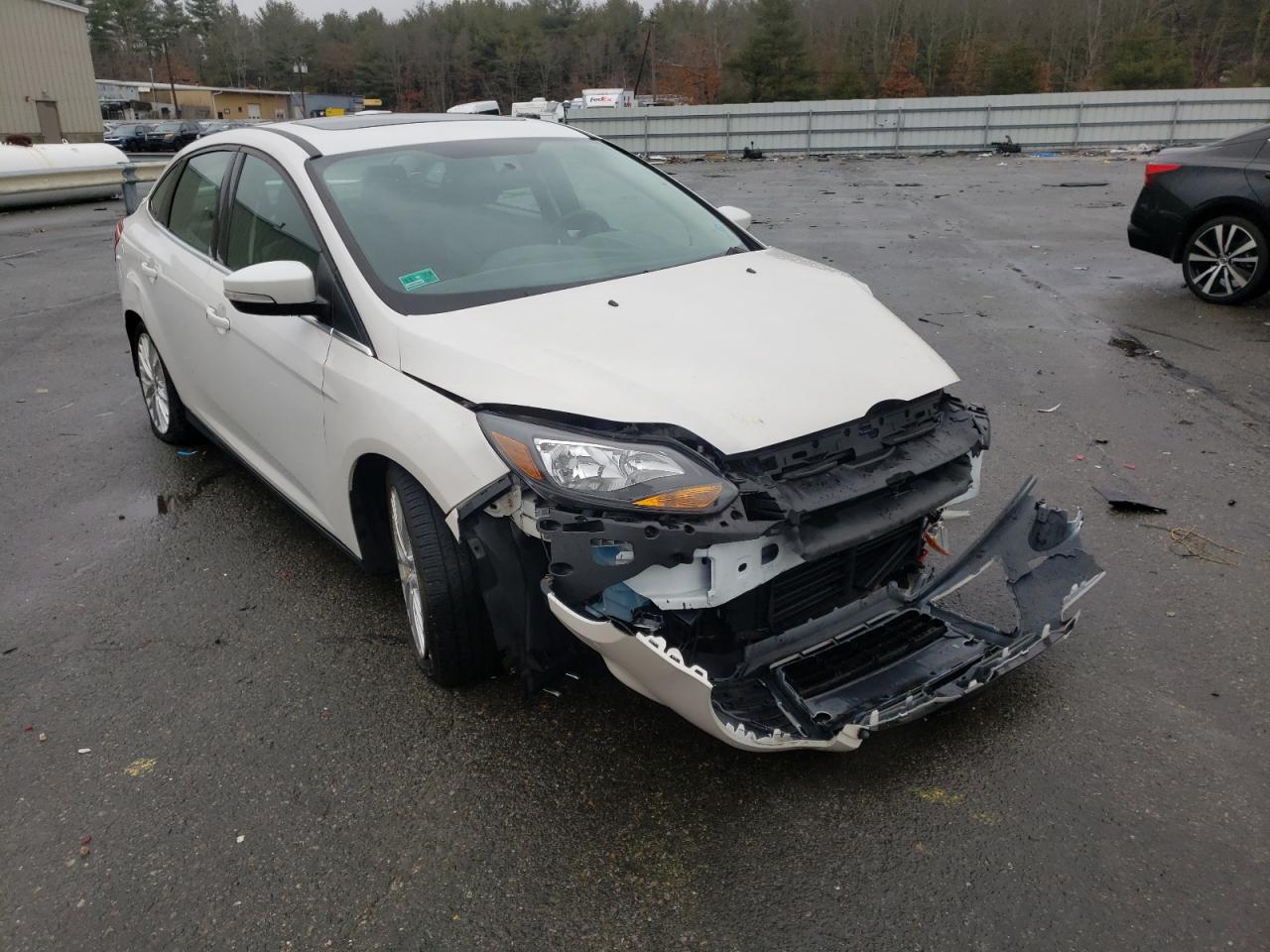Photo 1 from auction – 2014 FORD FOCUS TITA with VIN 1FADP3J2XEL101671
