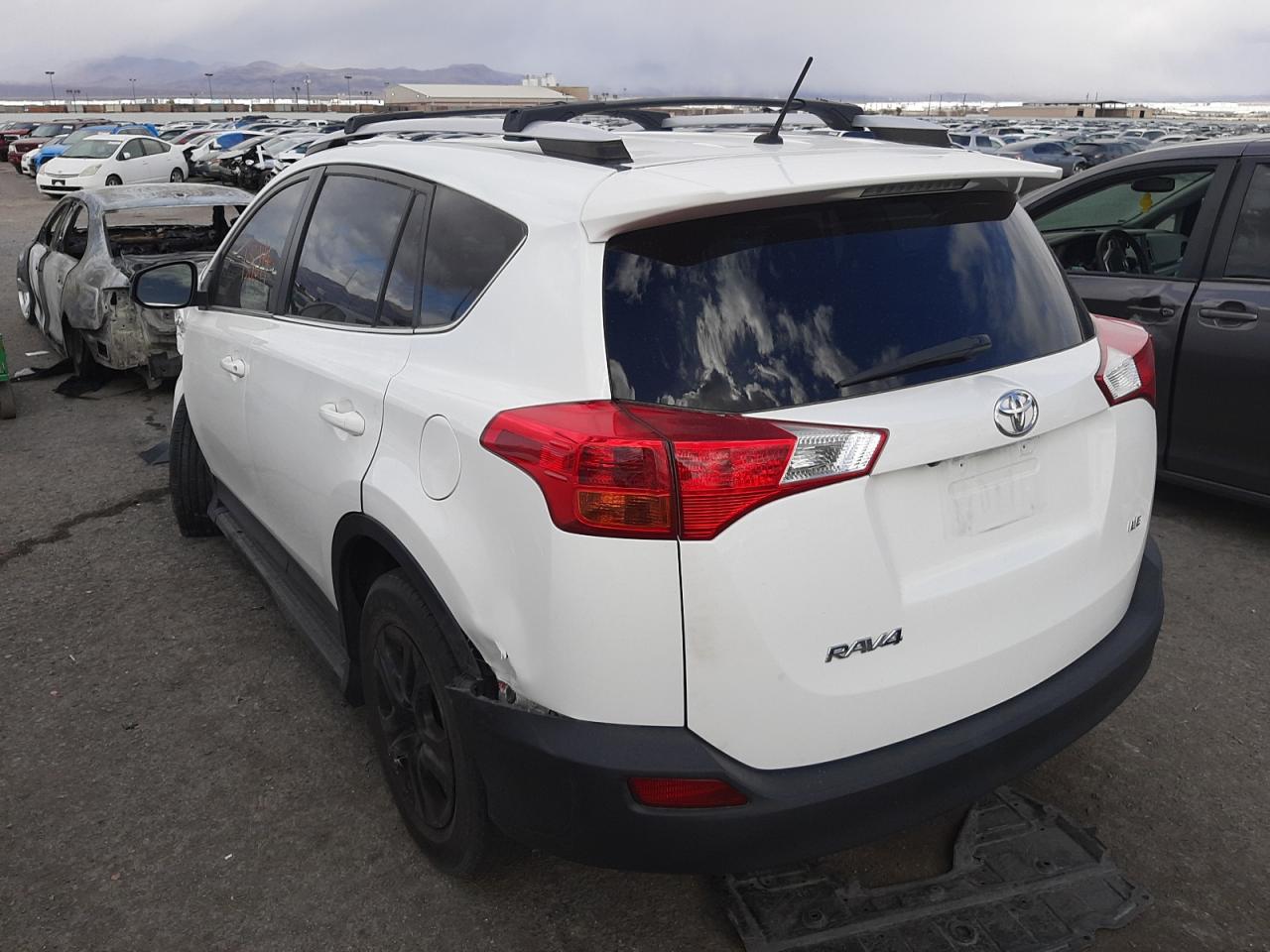 Photo 3 from auction – 2014 TOYOTA RAV4 LE with VIN JTMZFREV8EJ021677