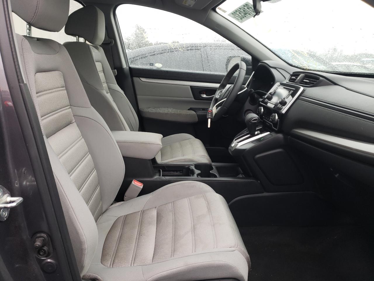 Photo 5 from auction – 2017 HONDA CR-V LX with VIN 7FARW5H38HE011542