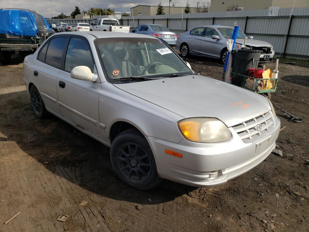 Photo 1 from auction – 2003 HYUNDAI ACCENT with VIN KMHCG45CX3U494329