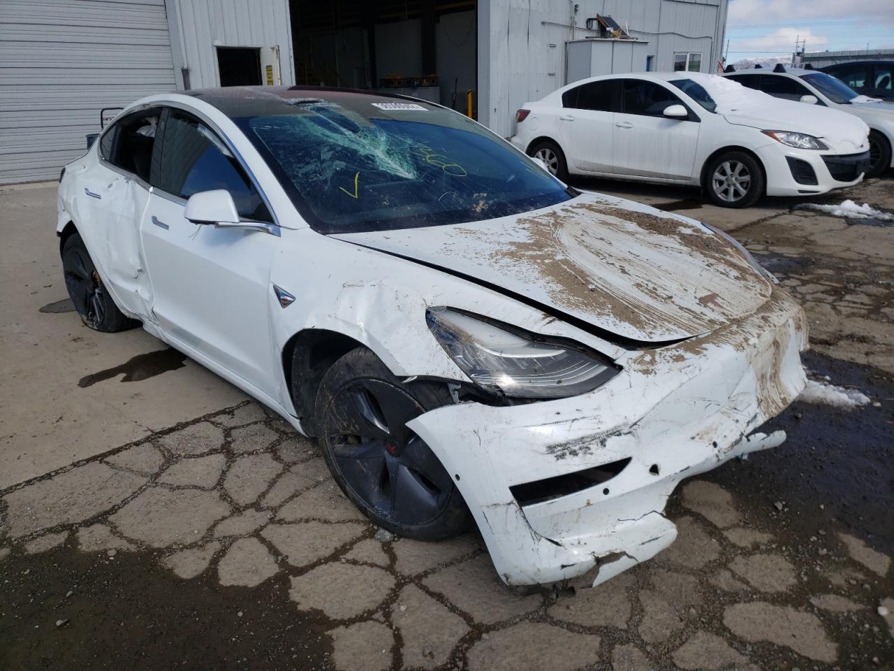 TESLA MODEL 3 2018 with VIN 5YJ3E1EA9JF038819 - Photo from auction