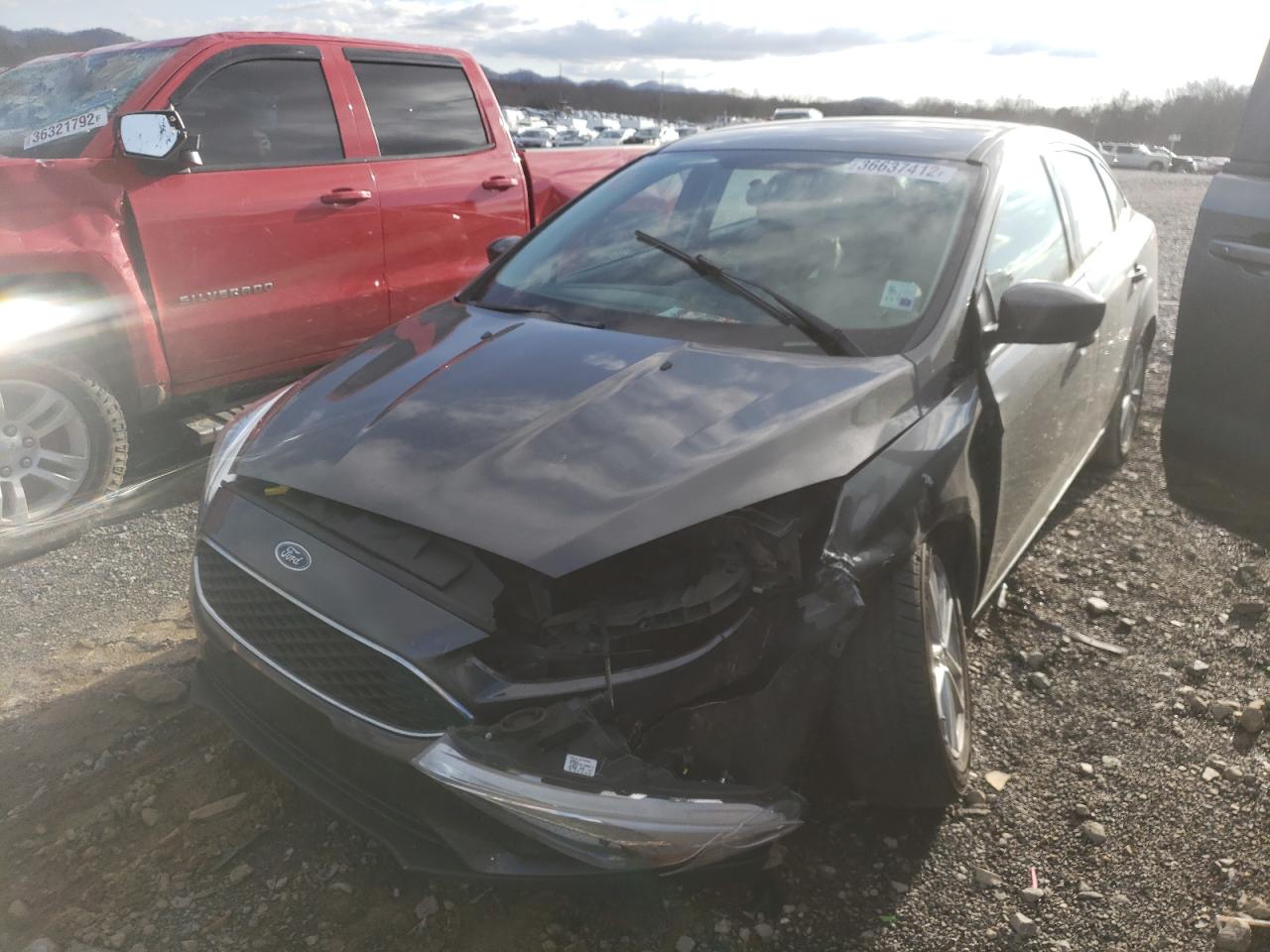 Photo 2 from auction – 2018 FORD FOCUS SE with VIN 1FADP3F27JL265642