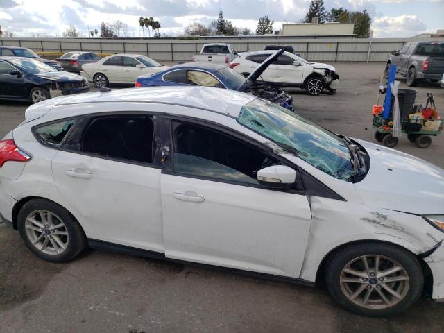 Photo 9 from auction – 2016 FORD FOCUS SE with VIN 1FADP3K29GL352036