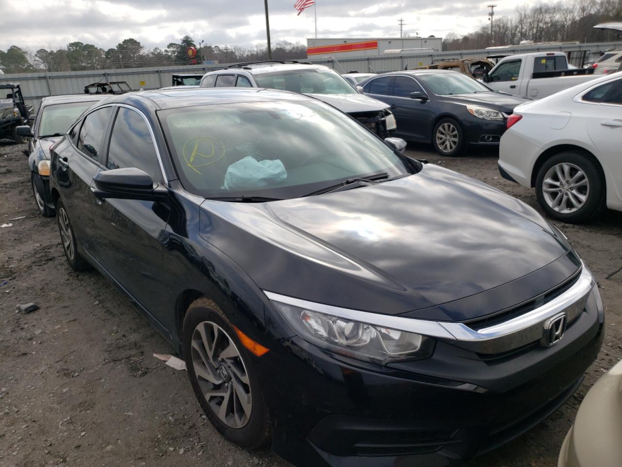 HONDA CIVIC EX 2018 with VIN 19XFC2F76JE015001 - Photo from auction