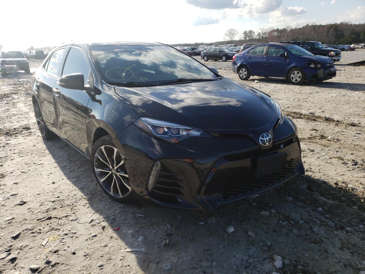 TOYOTA COROLLA L 2017 with VIN 5YFBURHE9HP726152 - Photo from auction