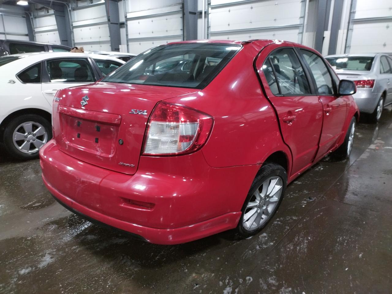 Photo 4 from auction – 2011 SUZUKI SX4 SPORT with VIN JS2YC5A40B6300135