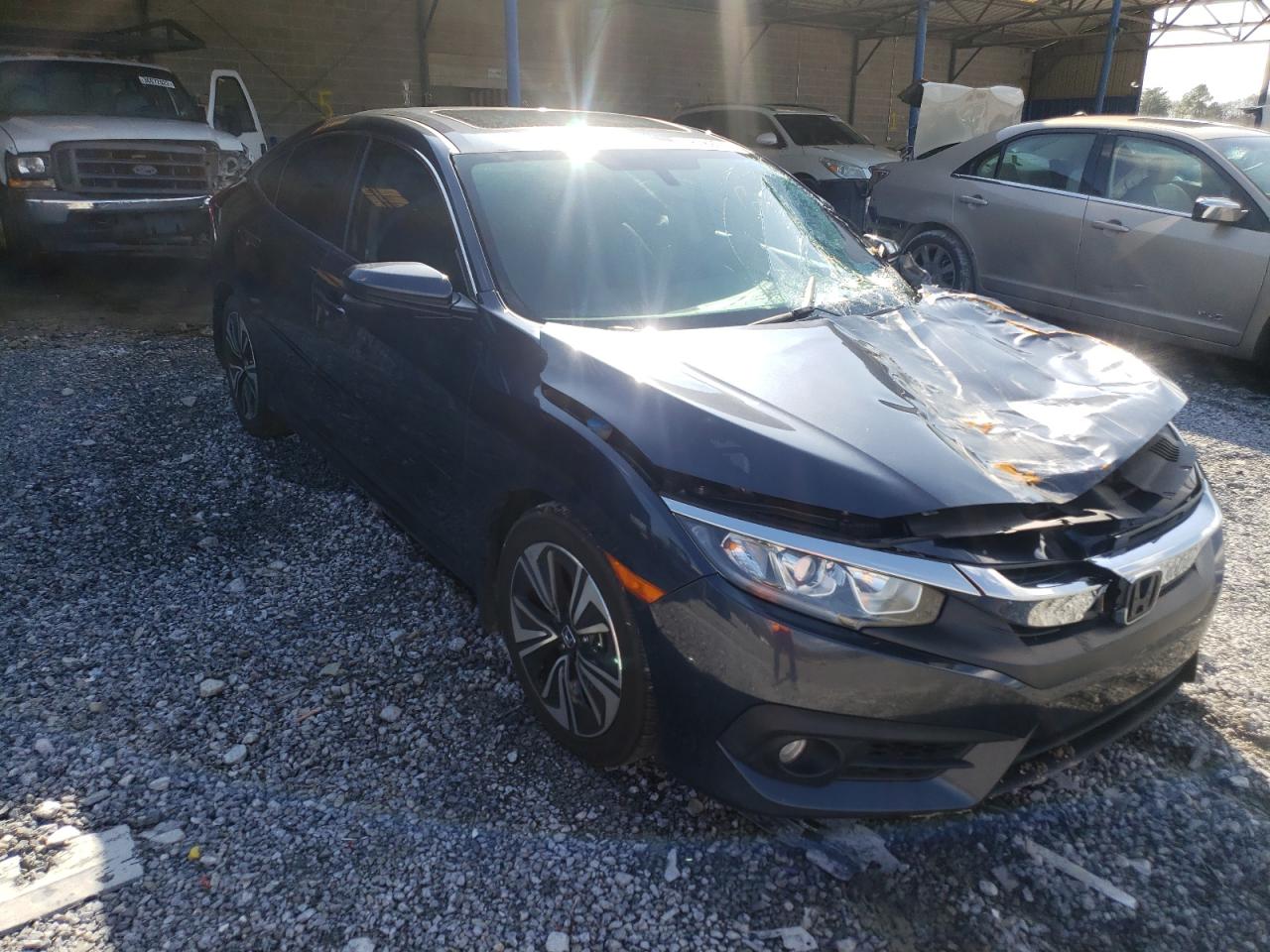 HONDA CIVIC EXL 2016 with VIN 19XFC1F73GE041347 - Photo from auction